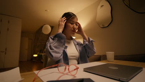 woman working late at night on laptop