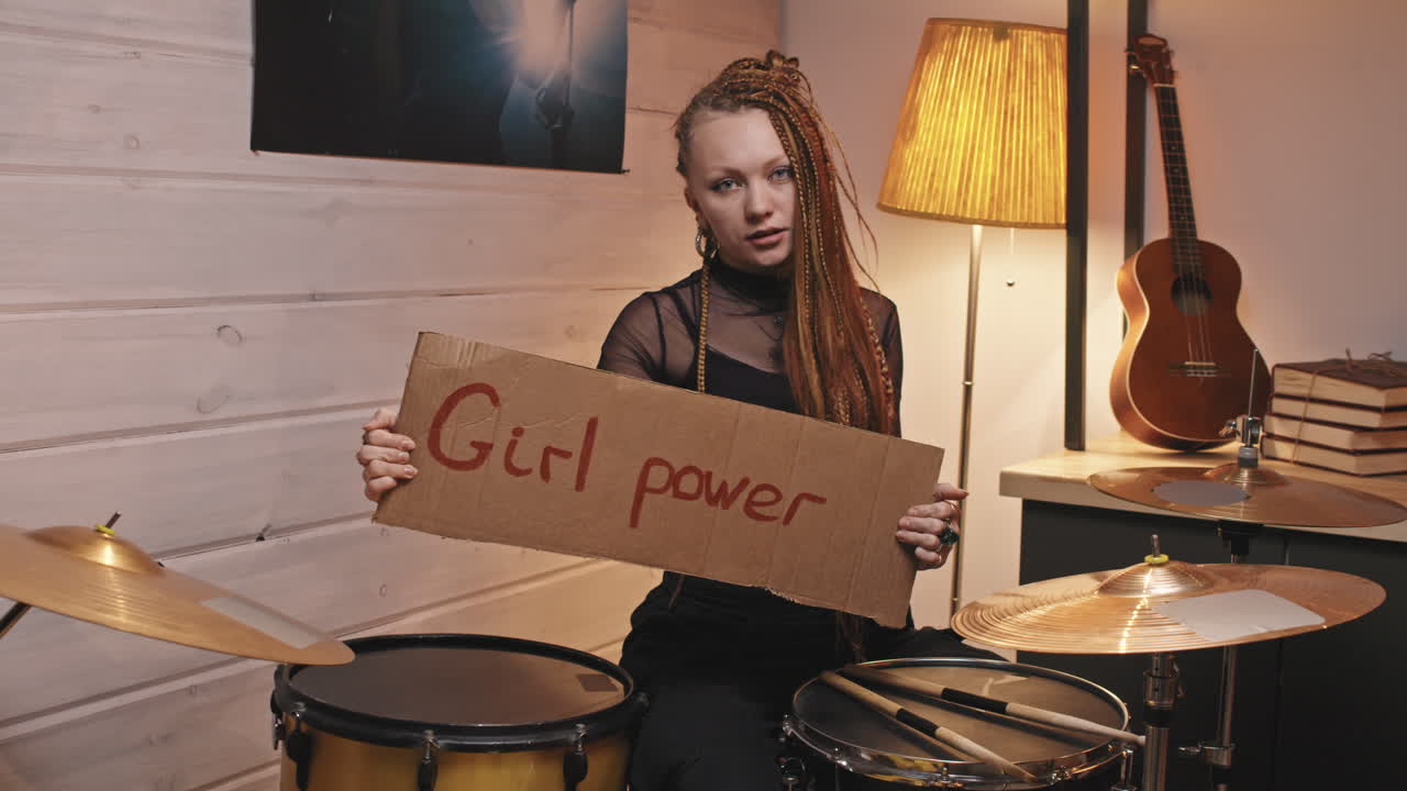 Female Drummer With Girl Power Cardboard Sign