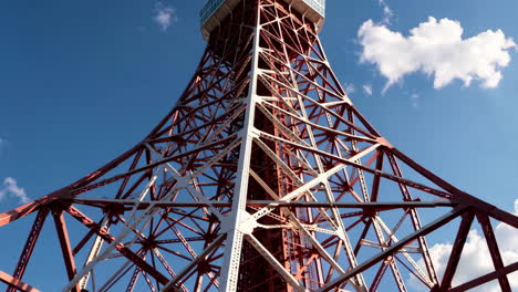 tokyo tower against a blue sky
