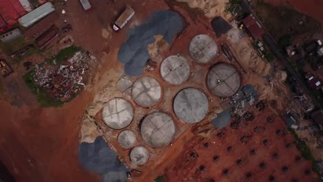 circular concrete structures at industrial construction site near lagos highway