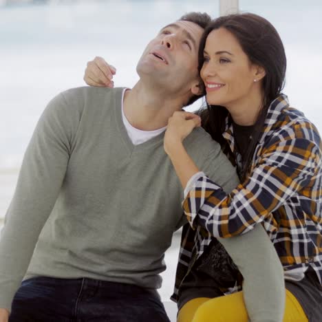 loving young woman hugging her boyfriend