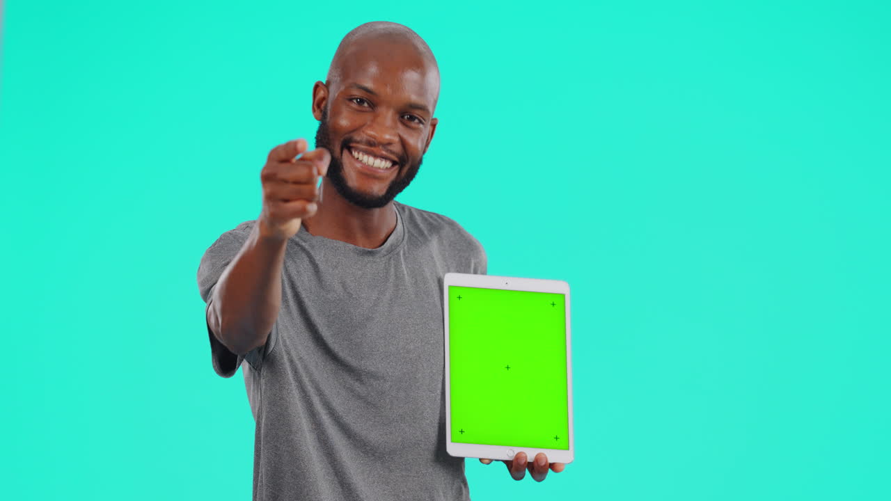 Black man, tablet and green screen pointing to you