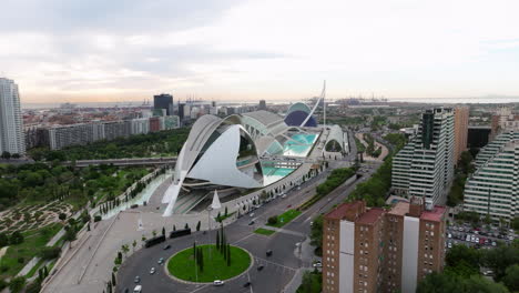 flying towards ciudad de las artes y las ciencias, science museum in valencia, spain at sunrise - drone shot