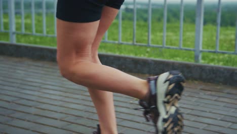 a person running in athletic shoes