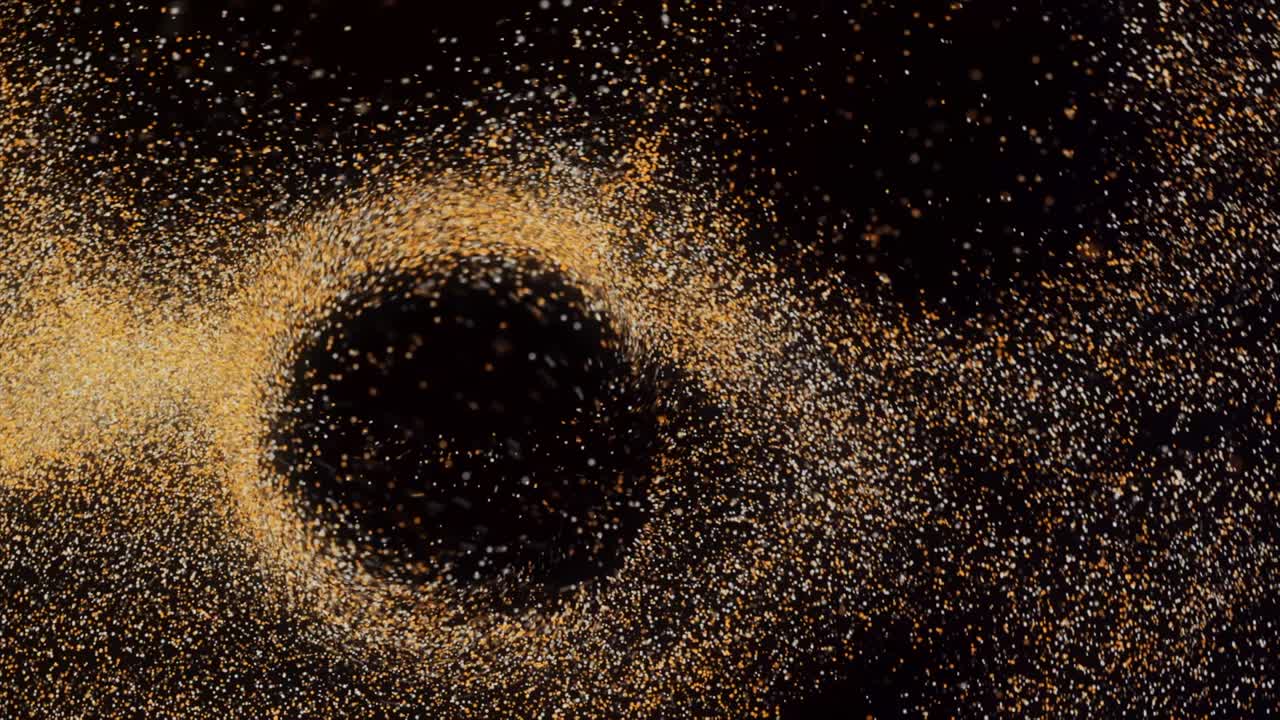 Abstract rotating pattern with millions of tiny grains of colorful sand ...
