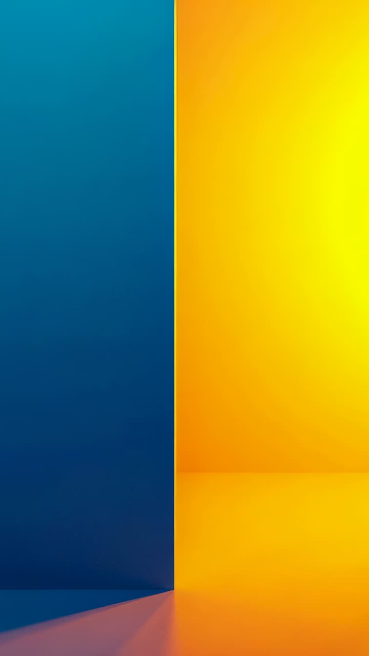 Vertical video: On play split-color panel transitioning from orange to yellow on abstract backdrop