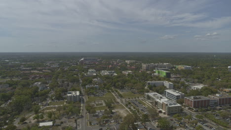 gainesville florida aerial v6 pull out shot over the college campus and surrounding areas - dji inspire 2, x7, 6k - march 2020