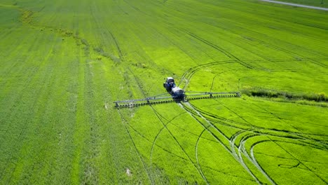 upper view tractor trailer makes circle traces on fields