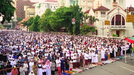 muslim people praying around the church