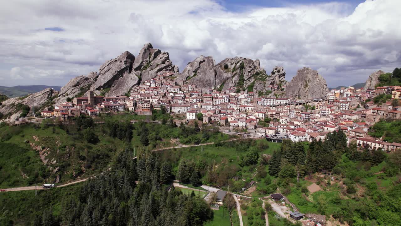 Aerial panoramic view of Pietrapertosa italian village near rocky mountain peak