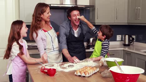 Happy-family-cooking-biscuits-together