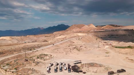 Dirt-Road-next-to-Gravel-Pit-at-Bluffdale-Utah---Aerial-Wide-Shot