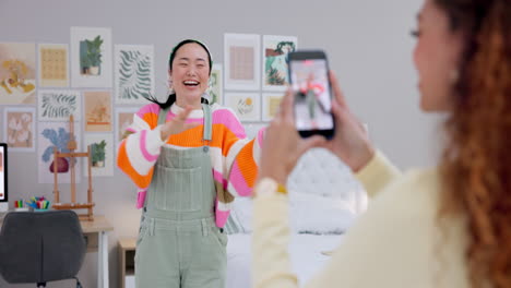 women recording dance with phone screen