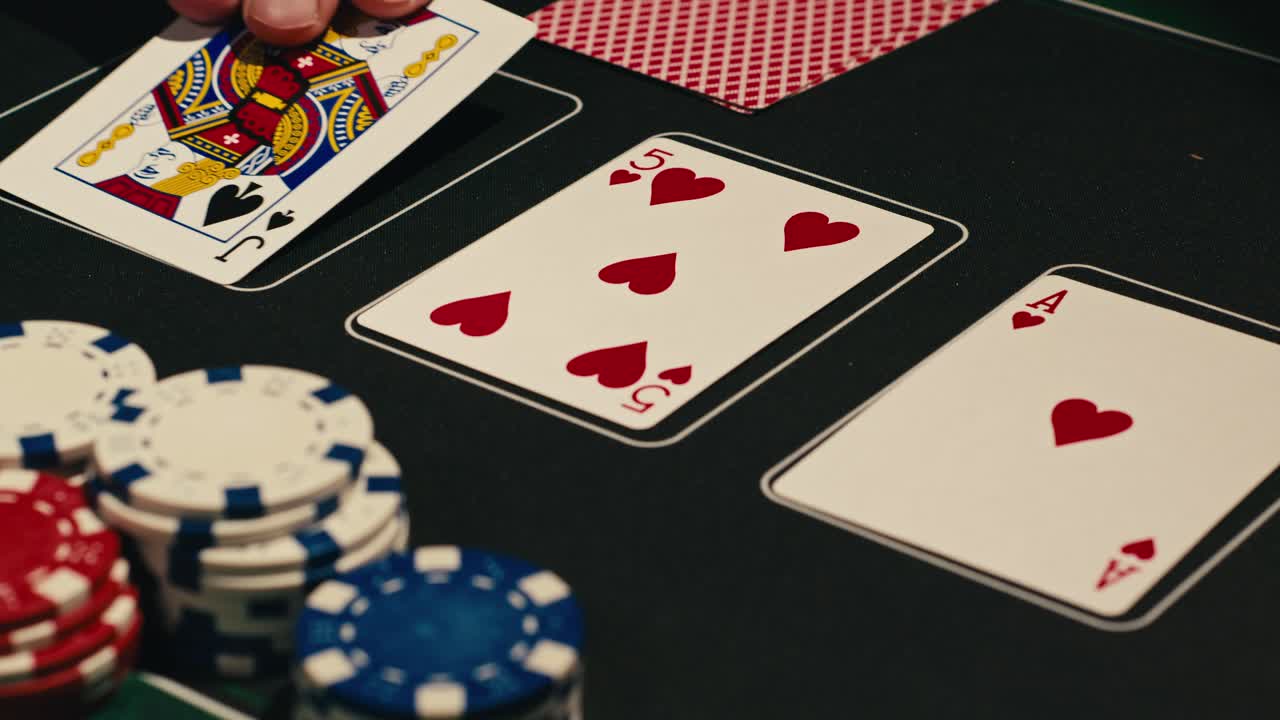Hands managing poker chips on green table, reflecting intense poker gameplay with the element of chance and skill