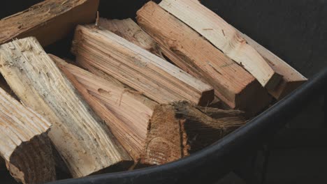 establishing shot of oak and pine cut, sliced and chopped firewood