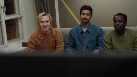 meeting of male friends in an apartment