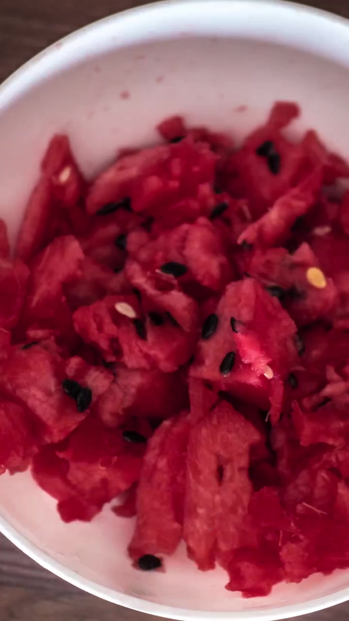 Timelapse of eating sweet watermelon from the bowl