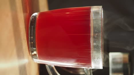 red drink in a glass cup