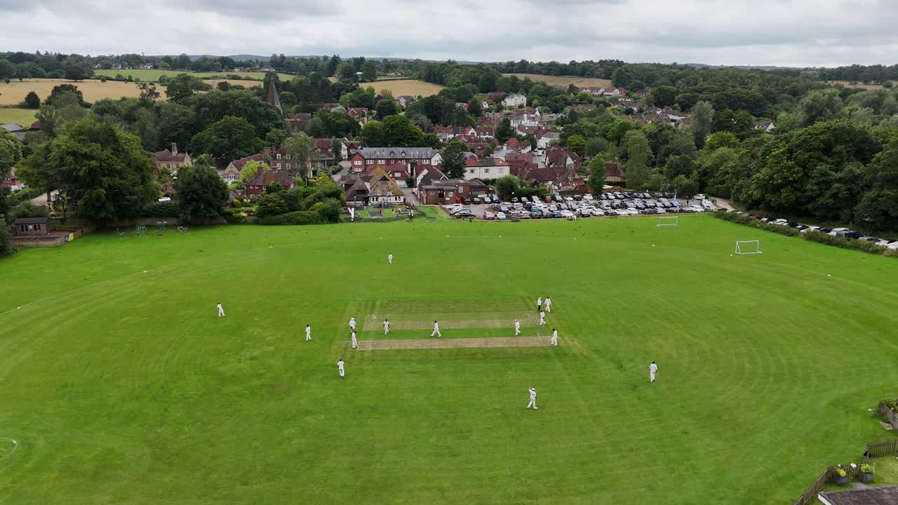 Cricket match Shere Surrey UK quaint English Village aerial drone