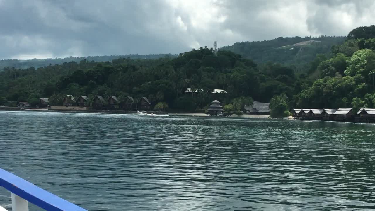 4K video from a boat in the Philippines arriving at an Island