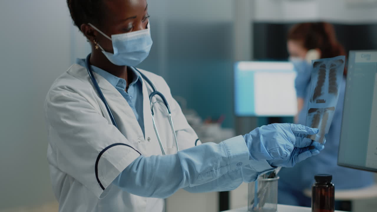 Doctor examining x-ray