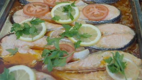 baked salmon with lemon, tomato, and parsley