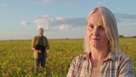 woman farmer in soybean field