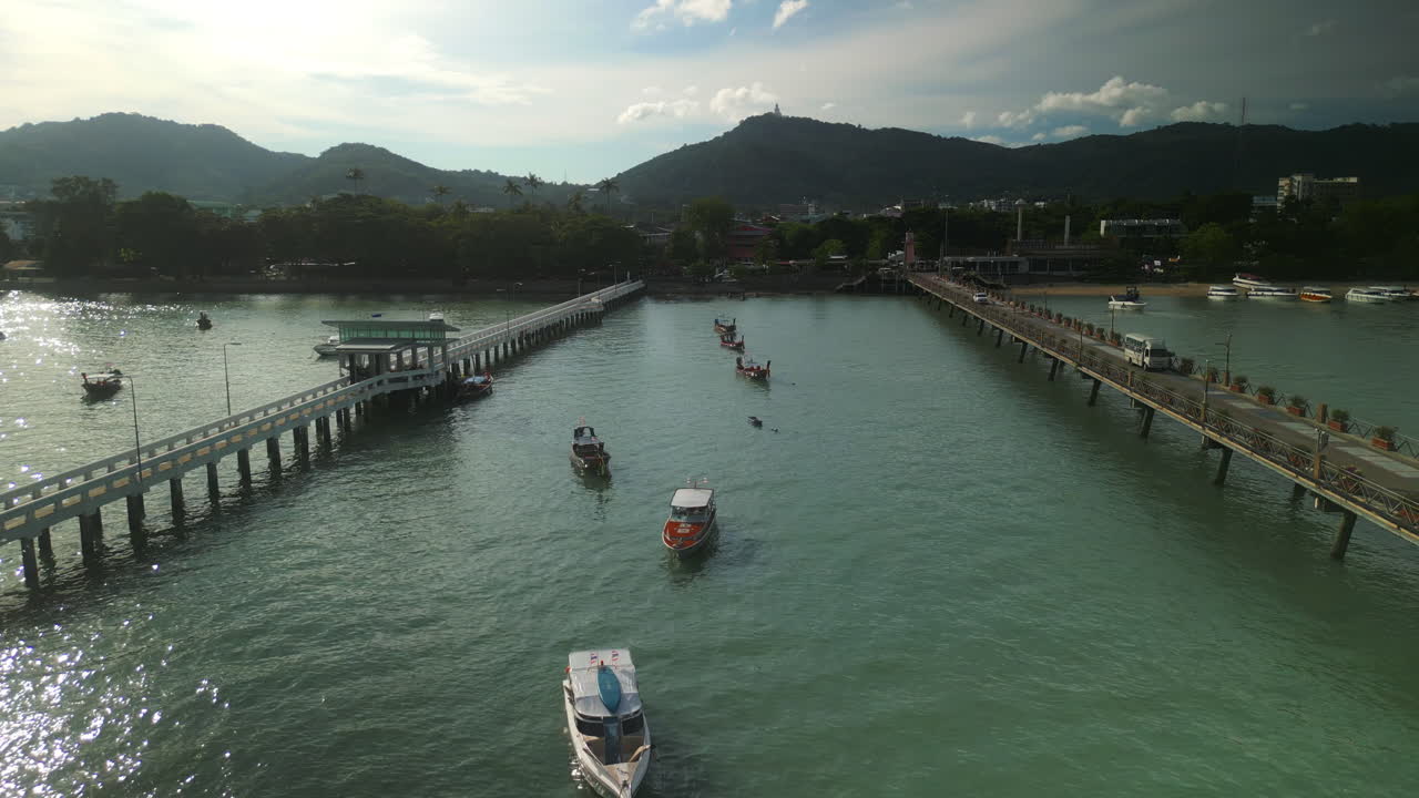 Longtail Boats and Ferry Terminal at a Coastal Pier