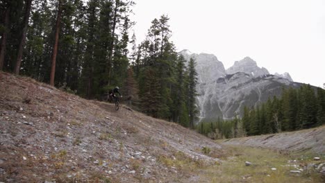 biker rides trough a slopepan