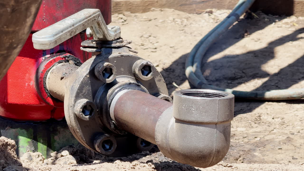 A pipe with gas coming out. Producing natural resources. Industry for drilling gas.