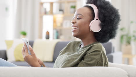 Cheerful-african-afro-woman-using-phone