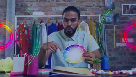 Animation-of-portrait-of-biracial-businessman-in-office-having-video-call-over-scope-scanning