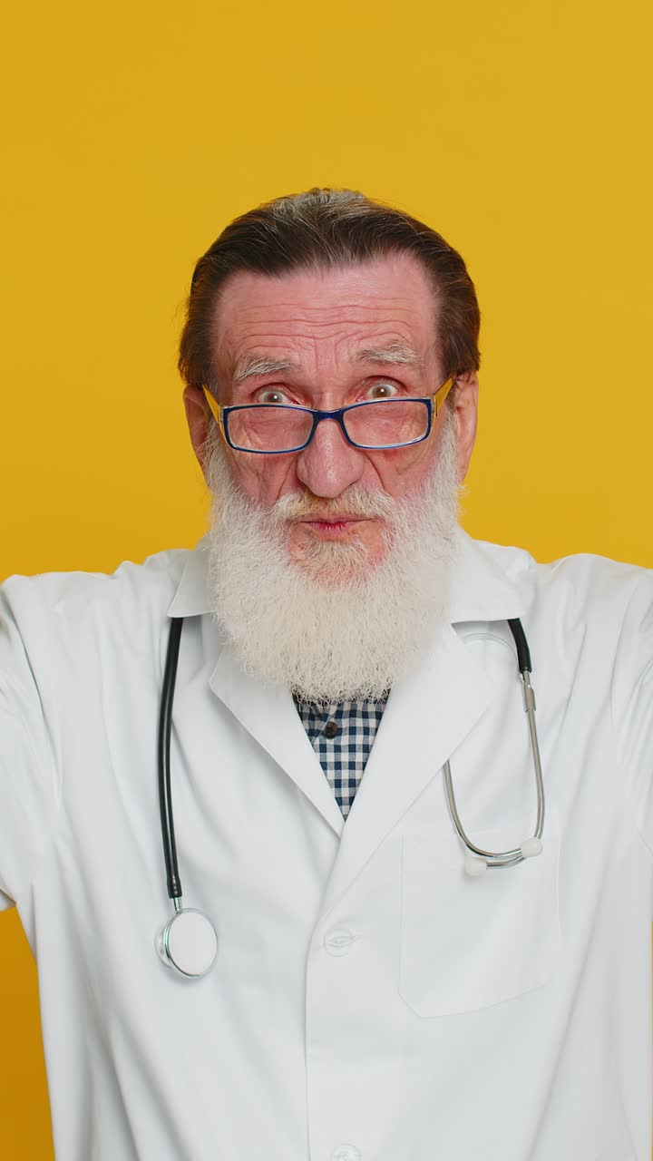 Excited amazed doctor man showing head explosion gesture solution inspiration success brainstorm