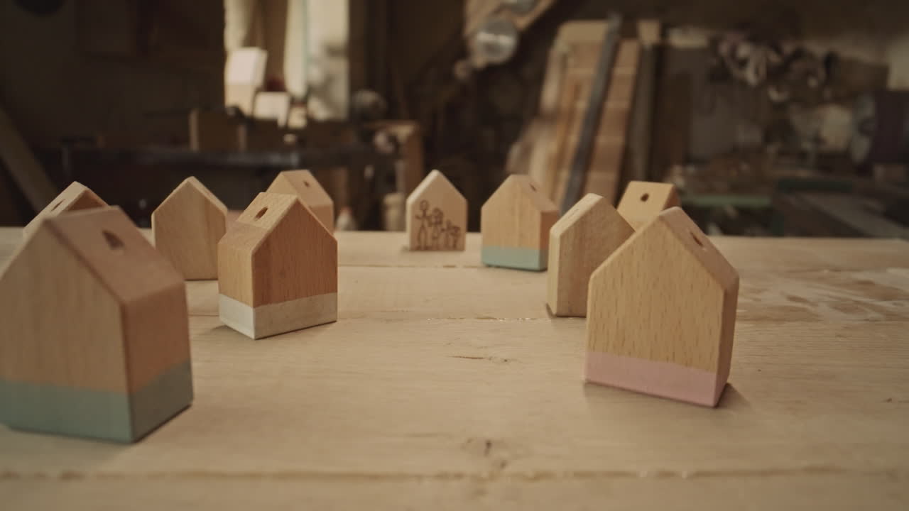 Handmade wooden houses with family drawing