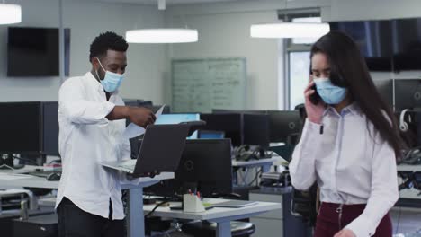 people wearing face mask working in office