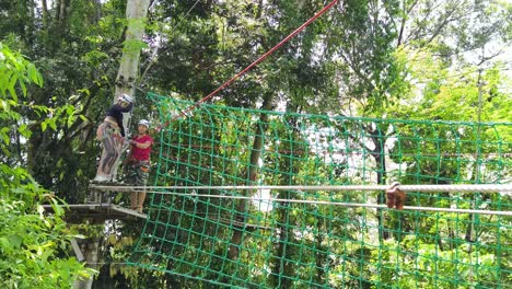 couple enjoying a forest adventure park