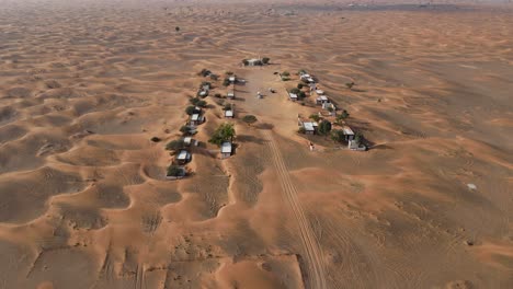 Aerial-view-of-Abandoned-Village-of-Madam-also-knows-as-Ghost-town,-Madam-Desert-town-in-Sharjah,-United-Arab-Emirates