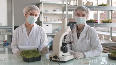 scientists conducting microgreens experiment in laboratory