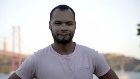 happy young man looking at camera