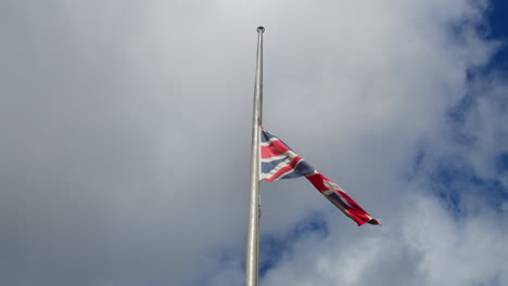 union jack national flag flown at half-mast following the death of her majesty queen elizabeth ii