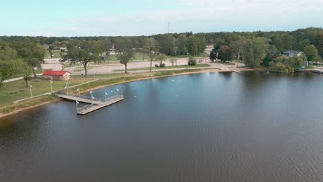 steel dock floating on the waters of mona lake in late summer