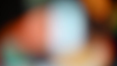 abstract blurred background with vibrant red, orange, and white hues