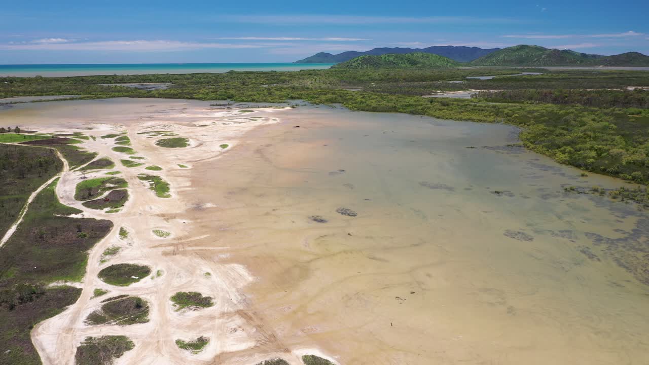 Overflight of tropical mangrove swamp with sandbanks