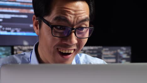 excited programmer celebrating success