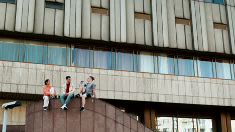 friends sitting on the street