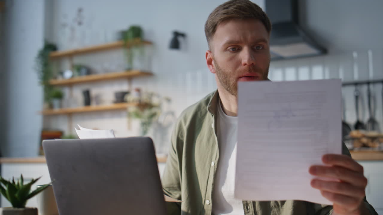 Serious businessman typing laptop at home office closeup. Busy manager working