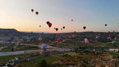 hot air balloons soar over cappadocia, turkey at sunrise, creating wonder
