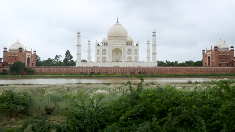 taj mahal seen from the banks of river yamuna, frontal view