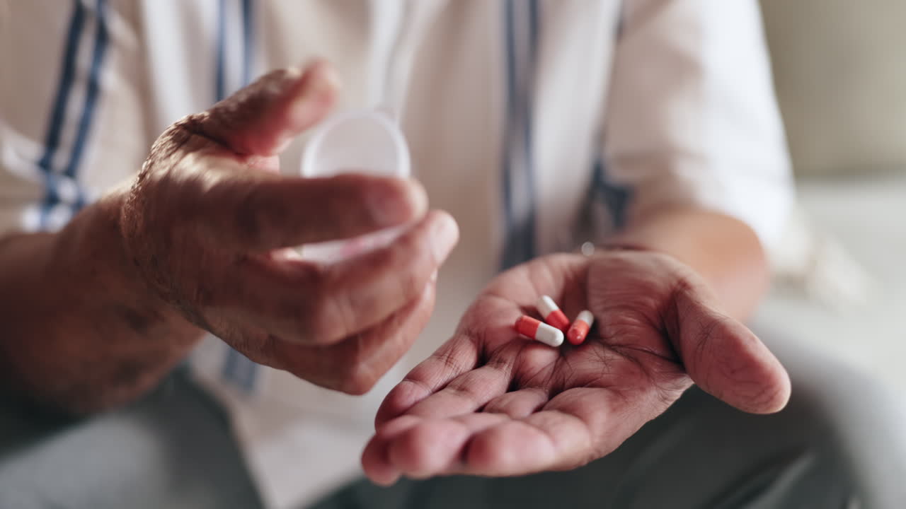 Elderly Person Taking Medication