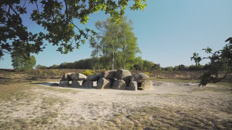 ancient stone monument in a rural landscape